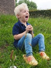wearing wooden shoes