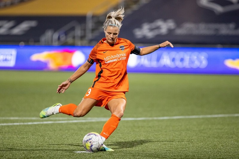 photo of a woman playing soccer